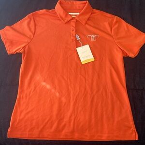 Women’s golf shirt by Greg Norman